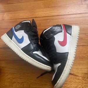 Nike High-Top Sneakers in Black, White, Blue, and Red